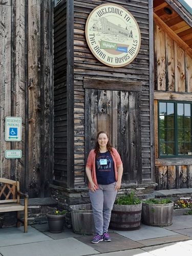 Photo: Stephanie Gibeault standing in front of the Barn at Boyds Mills