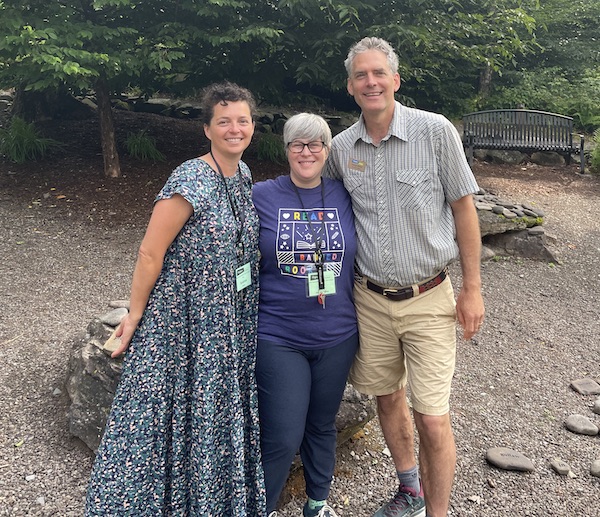 Andrea Cruz Floren (left) is pictured here on a personal retreat, with Zara González Hoang (center) and Executive Director George Brown (right).  Zara was Andrea's mentor in the Las Musas mentorship program, and they were excited to share time together again at the Highlights Foundation.