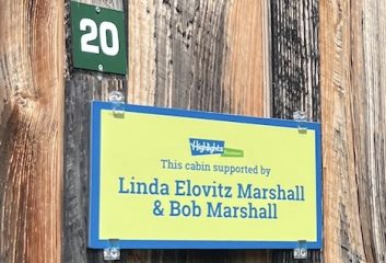 Sign on the Linda Elovitz Marshall & Bob Marshall Cabin 20 at the Highlights Foundation